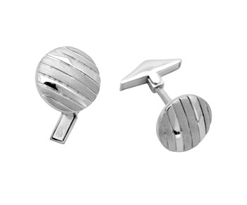 Gold cufflinks in 14K
					